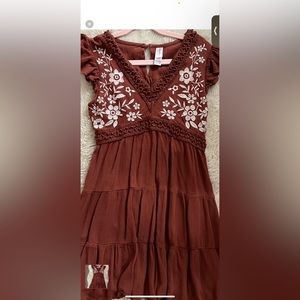 Beautiful fall style girls dress size 10. Pet free clean home.